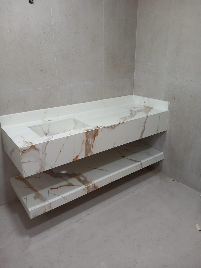 Floating stone vanity unit with a shelf below, installed in a villa bathroom — Reef Al Ghadeer, Al Ain
